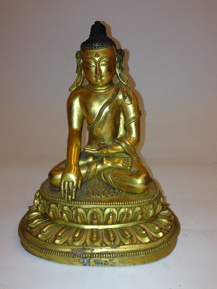 Gilt-bronze Of Chinese Antique Buddha Figure: Buddha figure, China, depicting Buddha seated on a double lotus pedestal, robe decorated with incised patterns. Carved flower Mark on base.