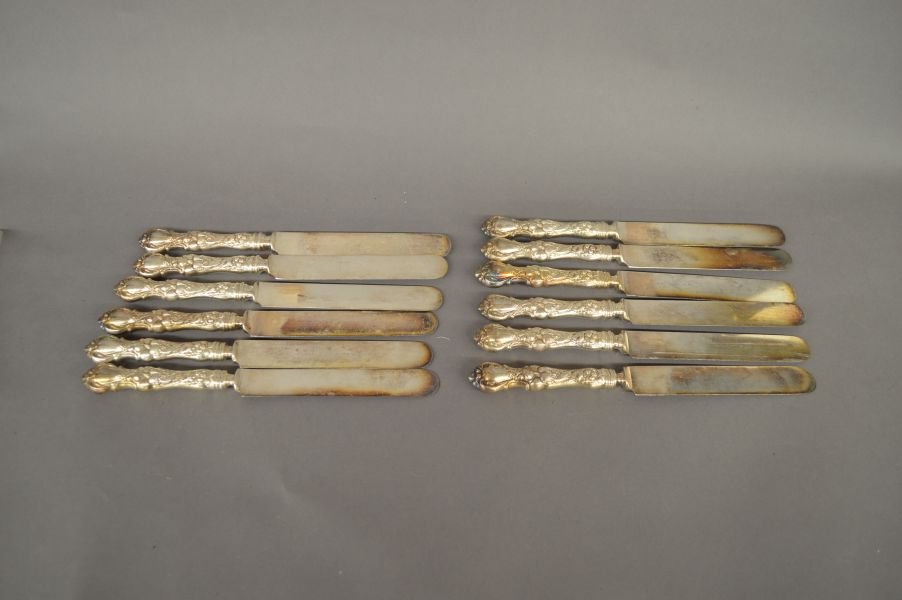 12 fancy silver knifes, 2 lb 6 oz: 12 fancy silver knifes, 2 lb 6 oz