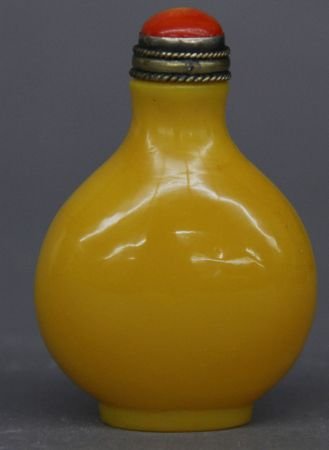 Yellow Peking Glass Snuff Bottle: Yellow Peking glass snuff bottle, China, round shape, no decorations on body, with a red bottle cap. 3"