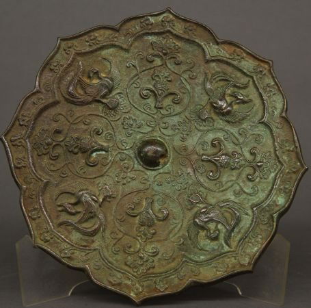 Bronze Mirror: Bronze mirror, China, flower shape, decorated with bird and flower patterns around a knot in the center.8 3/4"