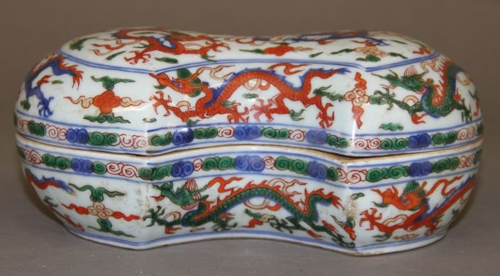Famille Verte Porcelain Box: Famille verte porcelain box, China, decorated with red, blue, and green flying dragons chasing a pearl amist clouds, with blue Wanli mark on base.8 1/2" X 3 1/2"