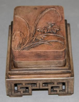 Carved Duan Ink-stone: Carved Duan ink-stone, China, rectangular shape, decorated with flower on cover, on a carved stand.3 1/2" X 4 1/2" X 3 1/2"
