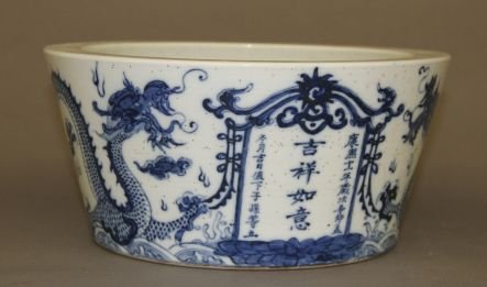 Blue And White Fish Tank: Blue and white fish tank, China, decorated with dragon amist wave and Chinese characters, blue Kangxi mark on base.5"T X 10 1/2" Diameter