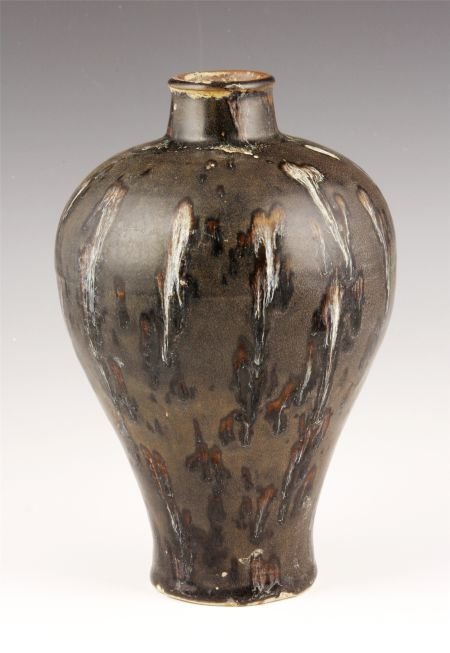 Black Glazed Mei Vase: Black glazed Mei vase, China, decorated with white and dark brown spots on a light brown ground.8 3/4"
