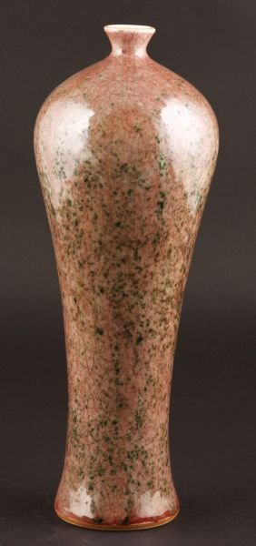 Red Glazed Vase: Red glazed vase, China, decorated with green spots on a light red ground. 10 3/4"