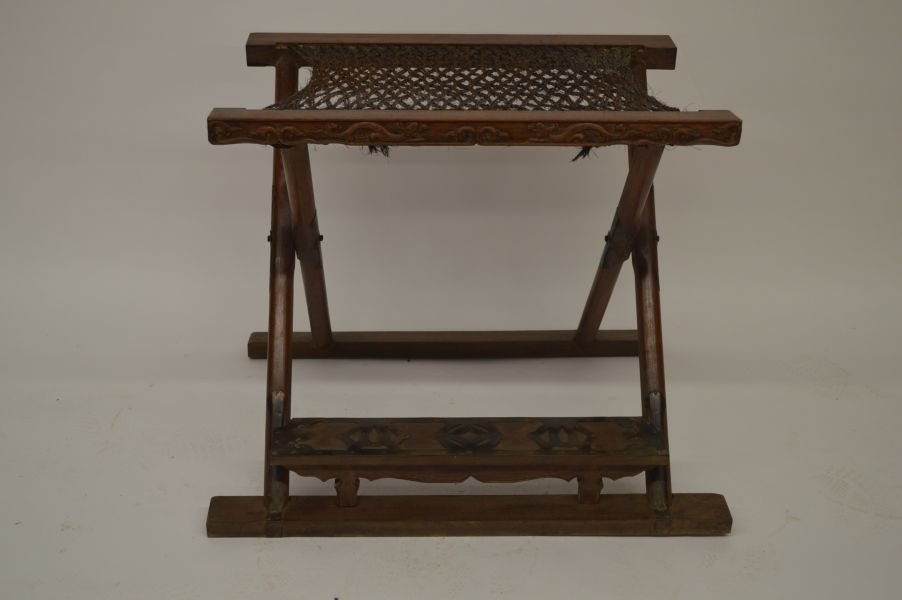 Antique Huanghuali Folding Stool: Folding Stool, China, Ming or later, decorated with carved dragon pattern on body