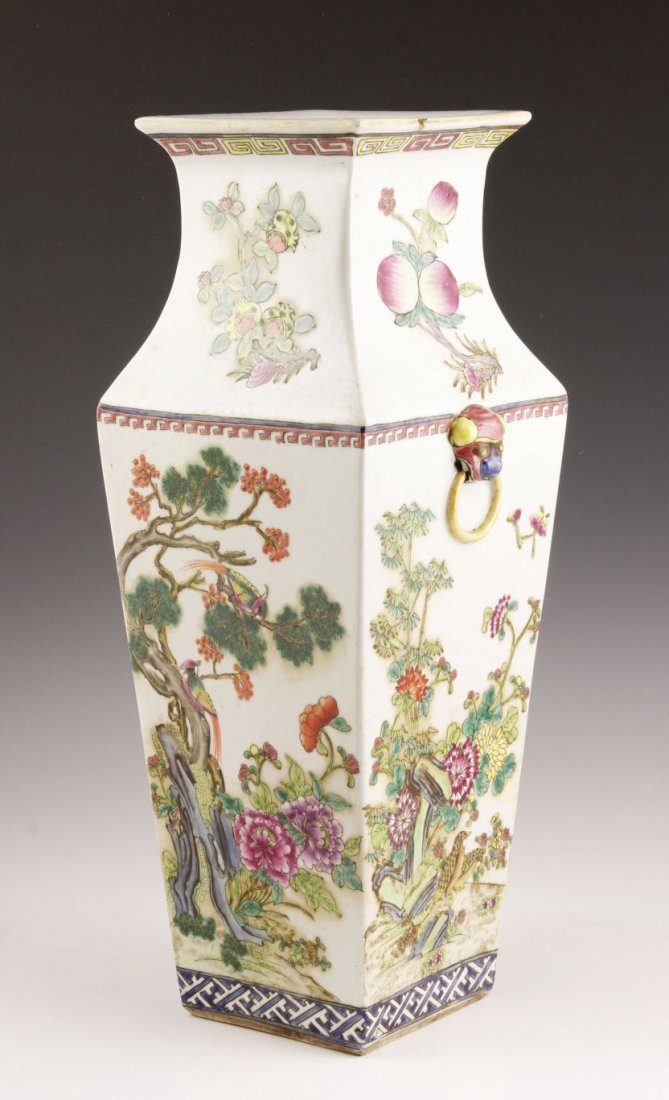 Square Famille Rose Vase: Square famille rose porcelain vase, China, with auspicious floral and animal decoration on each panel, with foo dog handles, 17"h.