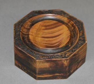 Carved Duan Ink-stone: Carved Duan ink-stone, China, octagon shape, decorated with carved floral motifs near around the rim and Chinese characters Mo Yuan in the center. 3 1/2"