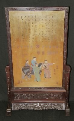 Chinese Zitan Table Screen: Large carved Zitan screen, China, decorated with Chinese figures and a horse on the screen, framed by Ziatn wood, with carved feet.25" W X 41" T