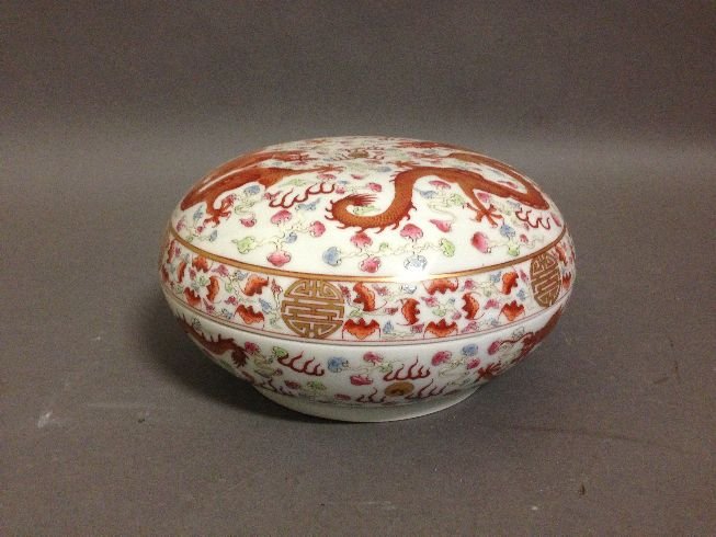 Porcelain Dragon Box: porcelain box, decorated with dragon and cloud, round shaped with six character blue color Qing Guangxu mark on base.