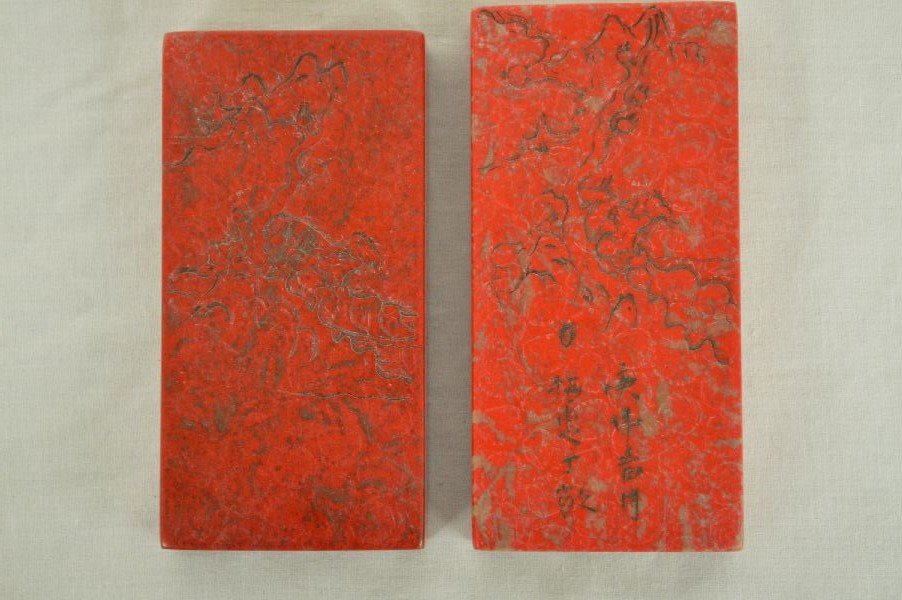 PAIR OF CARVED BLOOD RED STONE SEALS 4 1/2" X 2 1/4" (1 of 3)