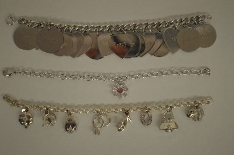 2 STERLING SILVER CHARM BRACELSTS WEIGHING 105 GM ABND (1 of 1)