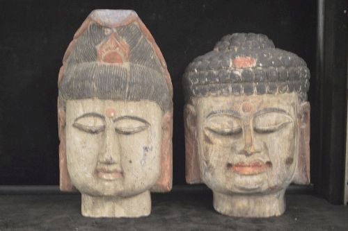 2 19TH CENTURY CARVED AND PAINTED WOOD BUDDHA HEADS; (1 of 2)