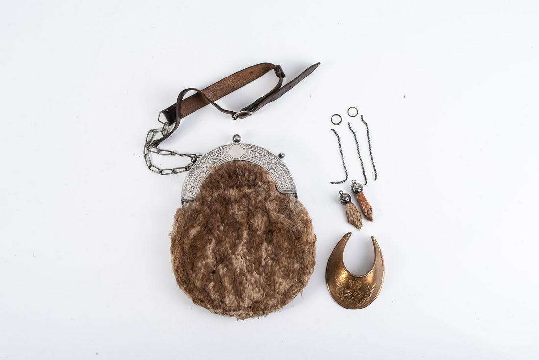 ANTIQUE SCOTTISH SPORRAN AND GEORGIAN OFFICER'S GORGET: ANTIQUE SCOTTISH SPORRAN AND GEORGIAN OFFICER'S GORGET Late 1890s Sporran which has two loose fur tasselswith chain. Waist strap intact. Georgian officer's copper gilt gorget is sold as a copy.