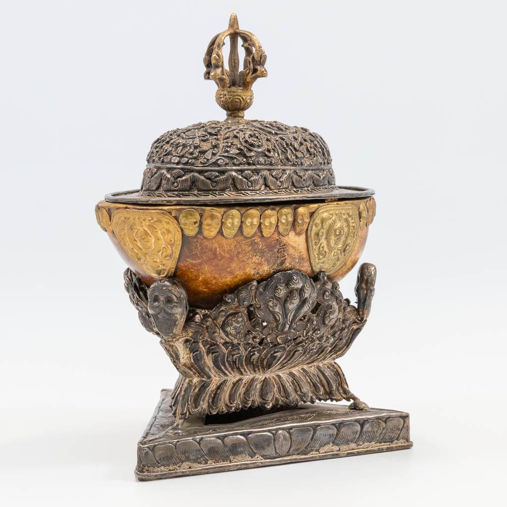 An antique Tibetan Kapala, made of a skull, decorated (1 of 14)