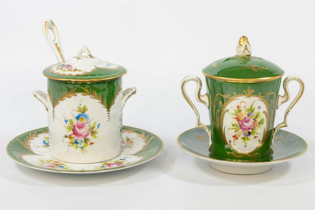 A tremble cup and sugarpot, made of hand-painted: A tremble cup and sugarpot, made of hand-painted porcelain with a flower decor and marked Limoges, France. (13,5 x 20 cm)