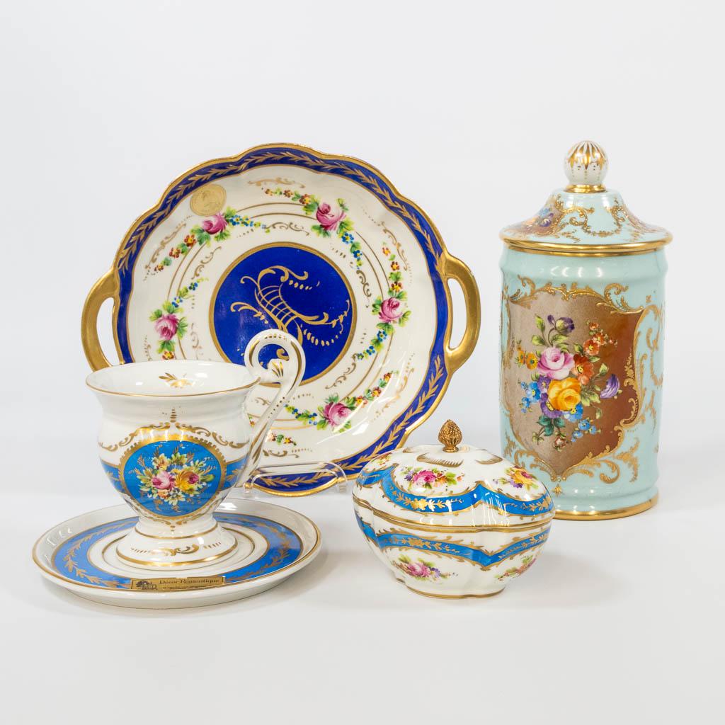 A collection of 4 items made of porcelain, with a (1 of 13)