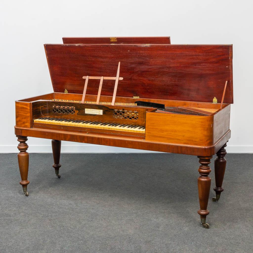 An antique and decorative Square piano made by 'John: An antique and decorative Square piano made by 'John Broadwood and sons' in London, England. (70 x 174 x 87 cm)