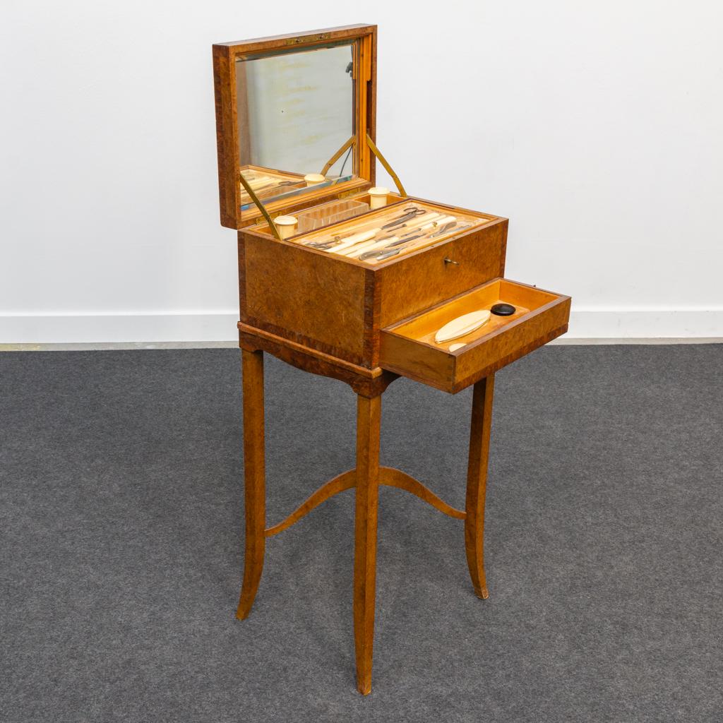 A vanity cabinet with pedicure and manicure set in art (1 of 16)