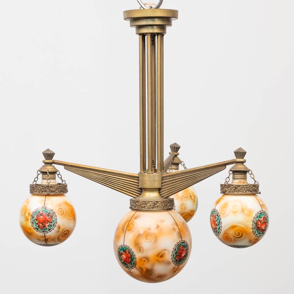 A decorative chandelier in art deco style with painted (1 of 10)