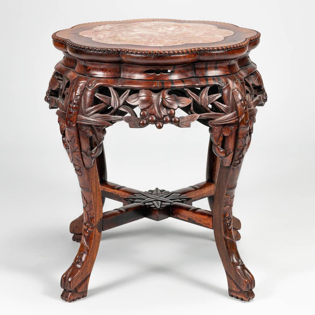 A side table made of Chinese hardwood and with marble: A side table made of Chinese hardwood and with marble top. (48 x 40 cm)