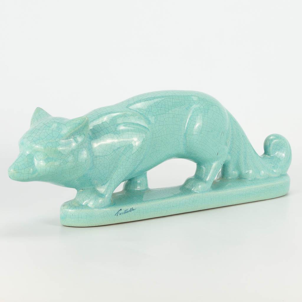 Jean de la Fontinelle (1900-1974) An art deco statue of: Jean de la Fontinelle (1900-1974) An art deco statue of a fox made of faience. Marked. (8 x 39 x 14 cm)