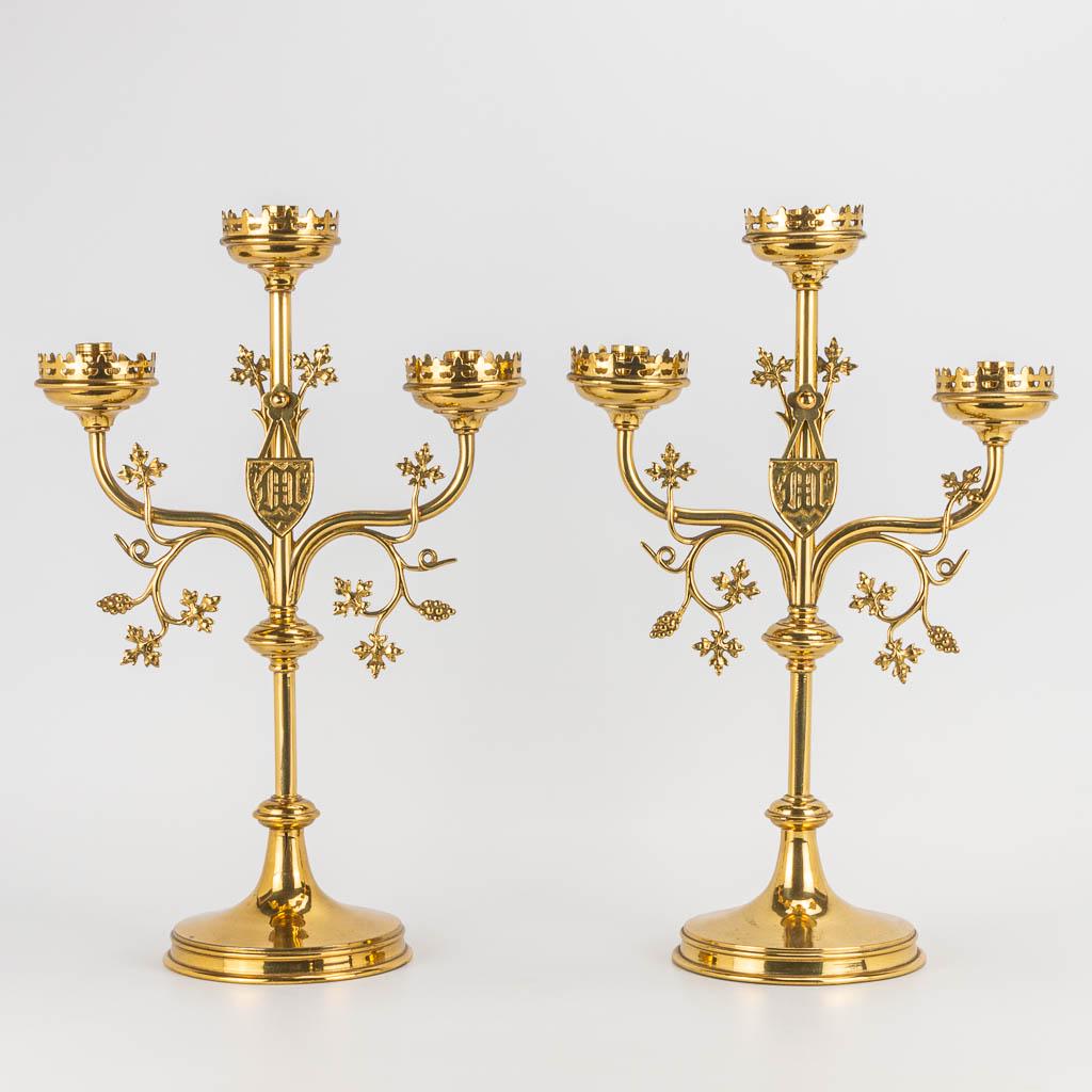 A pair of neogothic candelabra made of copper. The (1 of 6)