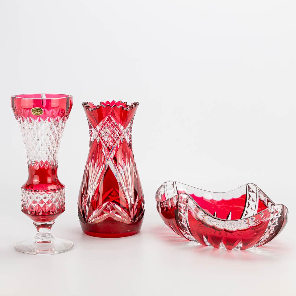 A collection of 3 red colored cut crystal vases, of (1 of 17)