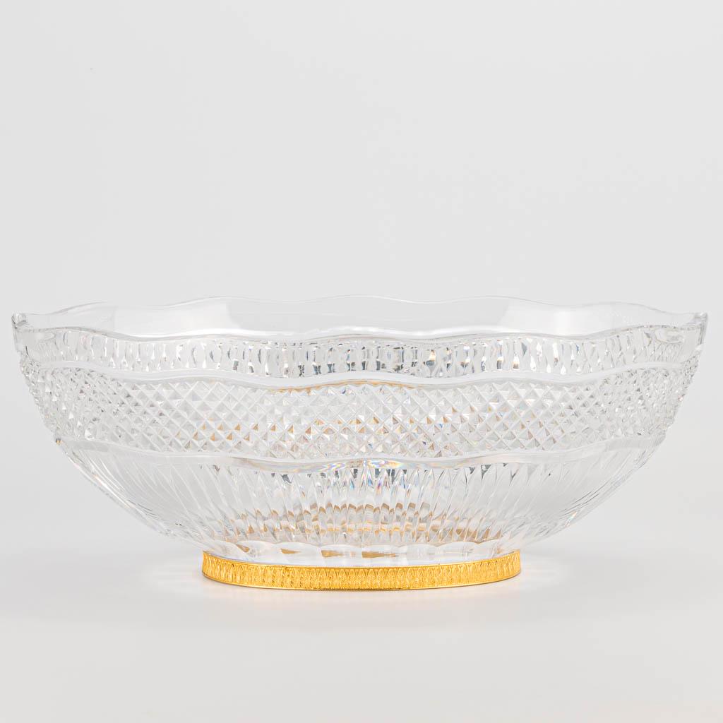 A large cut crystal bowl on a metal base, probably (1 of 16)