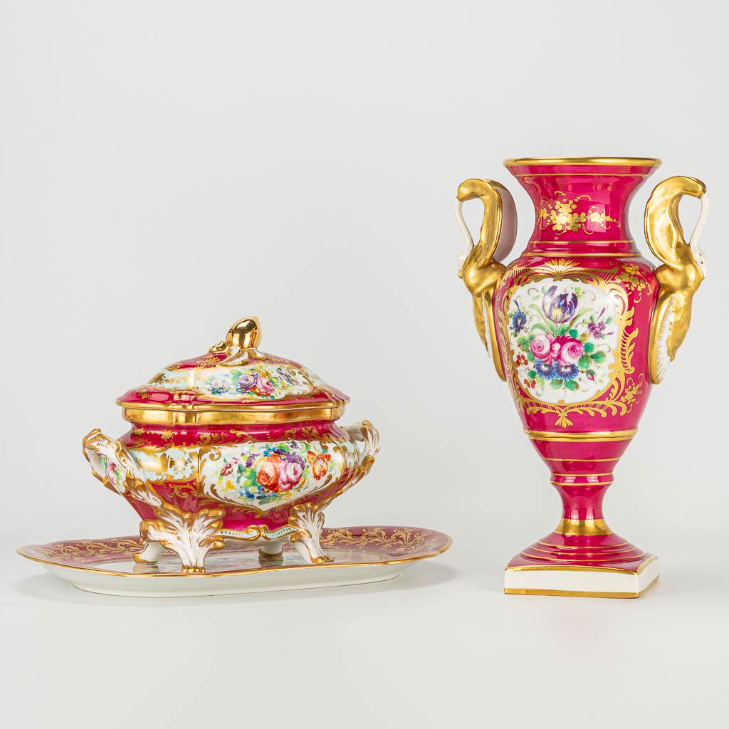 A vase made of porcelain in Empire style and a tureen: A vase made of porcelain in Empire style and a tureen on a serving tray. Both items are decorated with red glaze and hand-painted flower decor. Marked Limoges and Le Tallec. Measurement of the tureen: