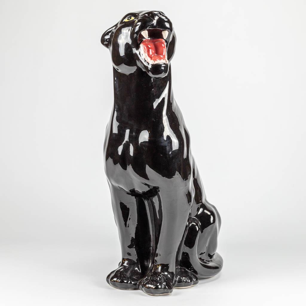 A ceramic statue of a black panther. Made in Italy. (1 of 8)