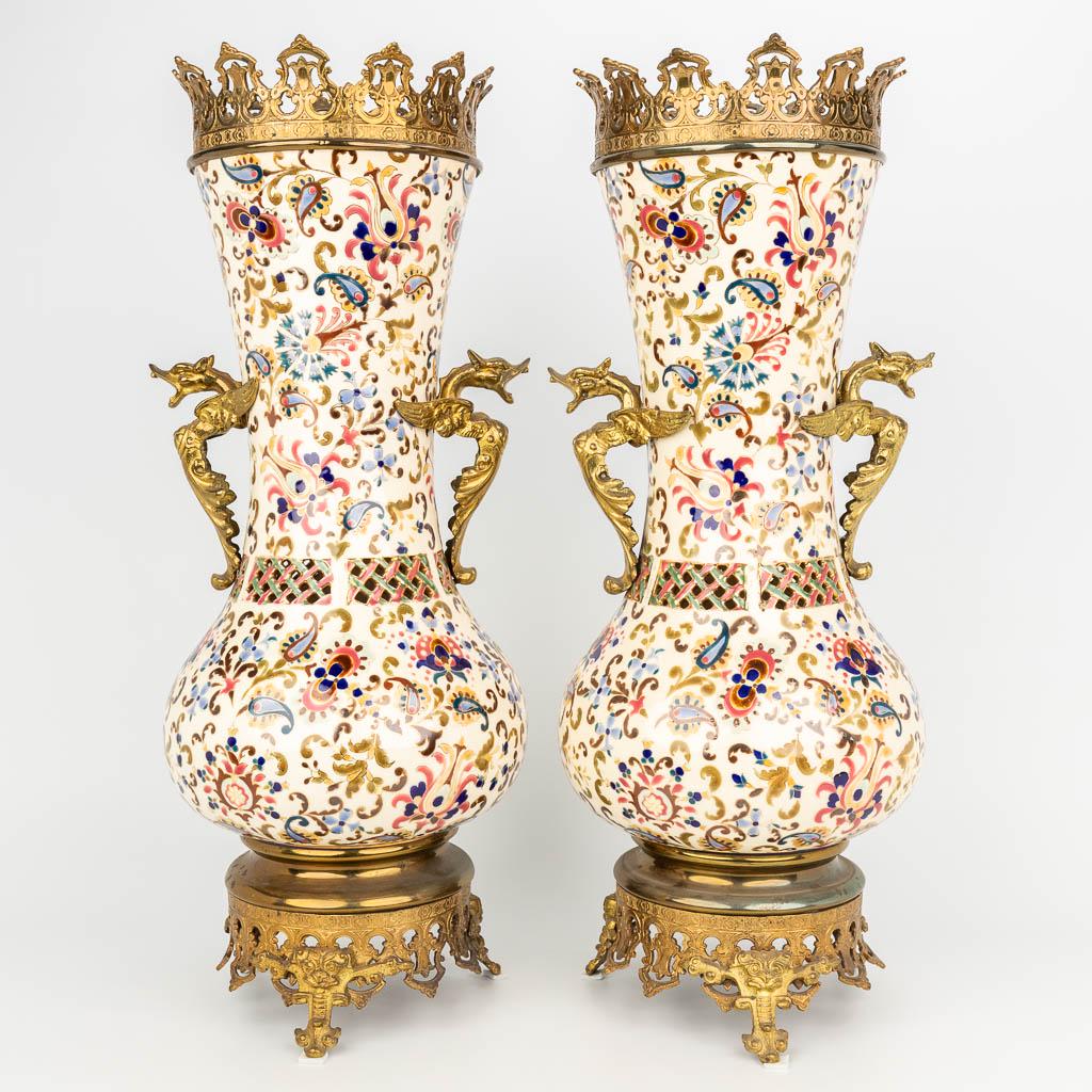 A pair of bronze mounted faience vases marked J.: A pair of bronze mounted faience vases marked J. Fischer Budapest, Hungary. (54 x 19 cm)