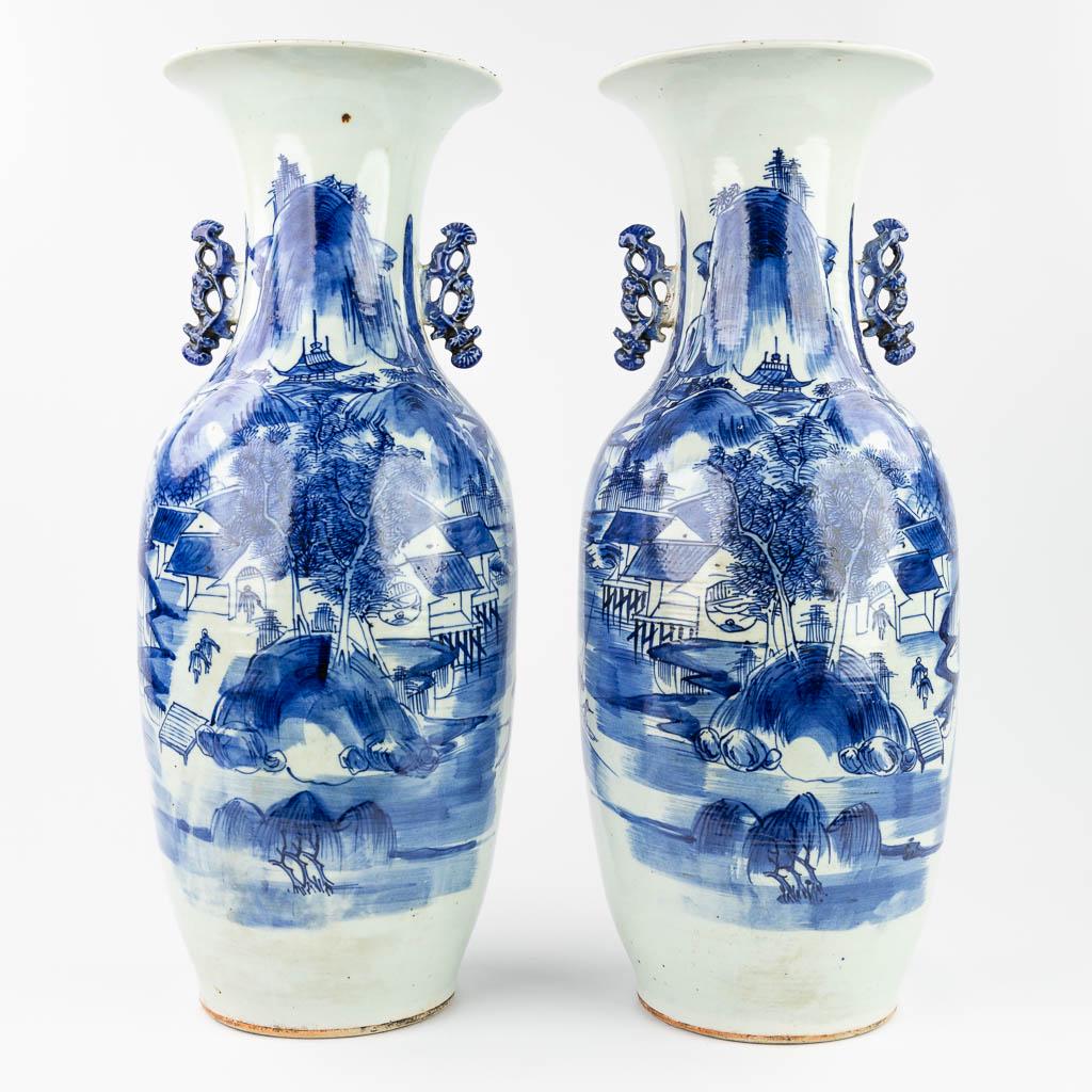 A pair of Chinese vases with blue and white decor of a mountain landscape (59 x 21 cm) (1 of 12)