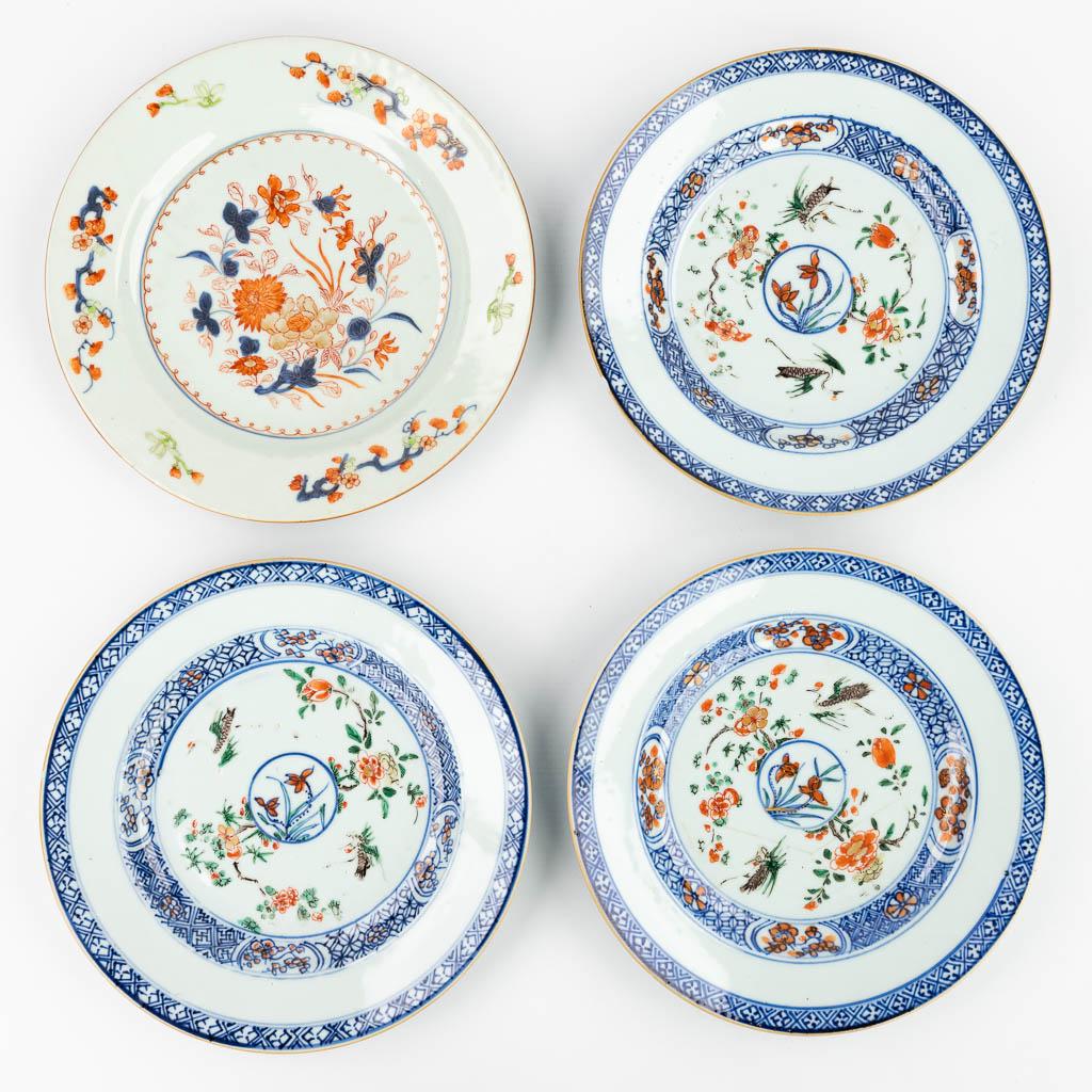 A collection of 4 Chinese plates, with a hand-painted decor. (22 cm) (1 of 13)