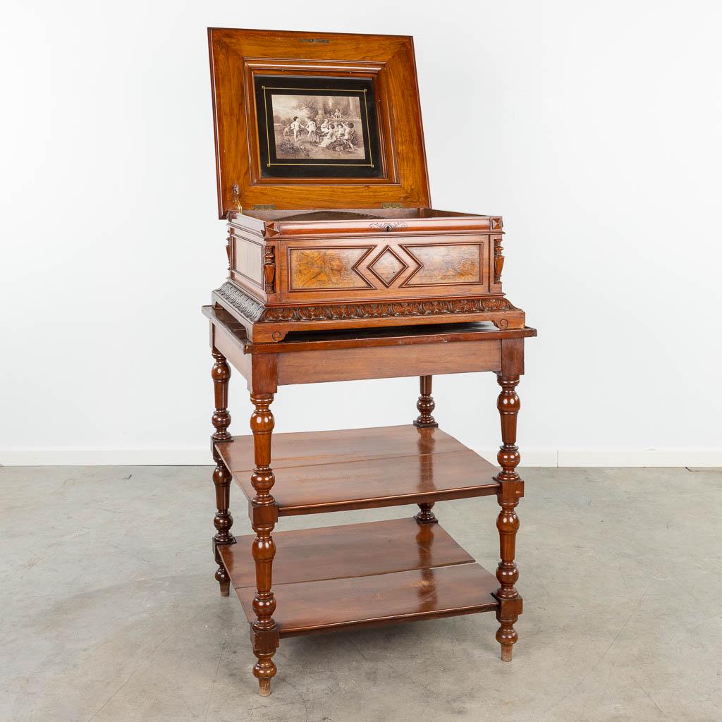 An antique Symphonium Polyphon Music box with large metal discs on a matching stand. (63 x 68 x (1 of 20)