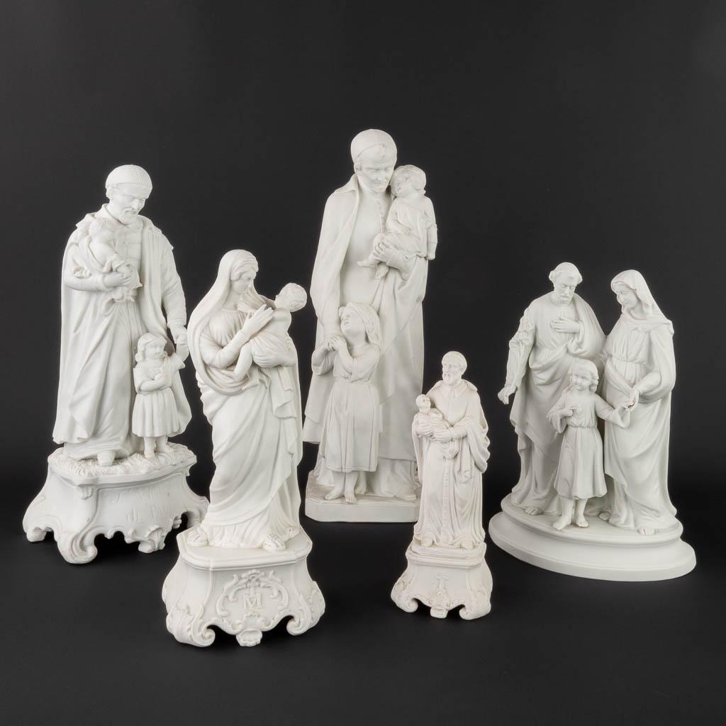 A collection of 5 bisque porcelain statues 'The Holy Family', 'Vincentius', 'Madonna with Child'.: A collection of 5 bisque porcelain statues 'The Holy Family', 'Vincentius', 'Madonna with Child'. Late 19th century, early 20th century. (H:44 cm)