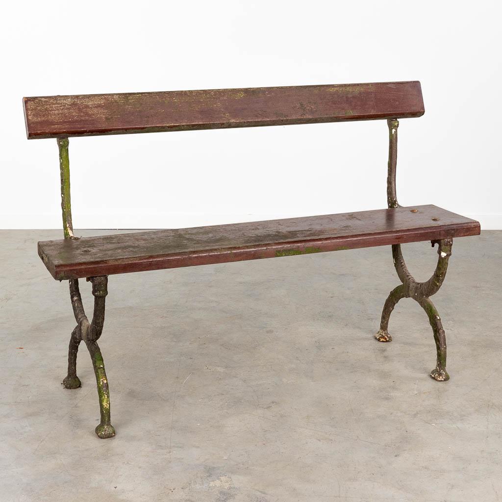 An antique garden bench, made of metal and wood.  (L:46 x W:120 x H:82 cm) (1 of 11)