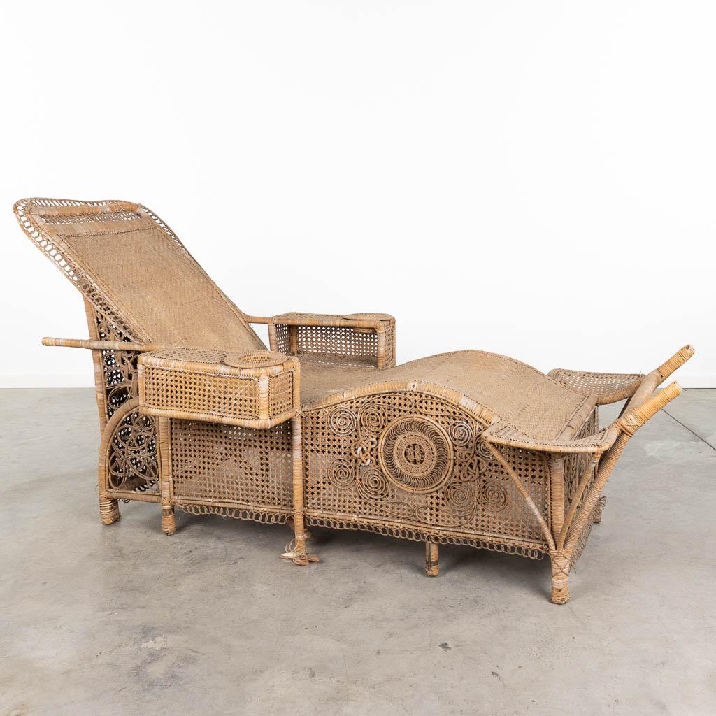 A decorative lounge chair, made of rotan. Probably made in France, circa 1930.  (L:87 x W:200 x H:95 (1 of 12)