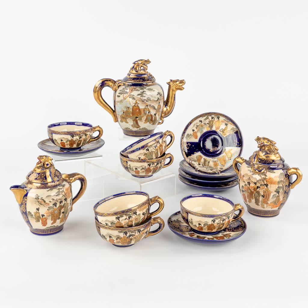 A 15-piece tea service, Satsuma stoneware, Meji period, Japan. (W: 21 x H: 17,5 x D: 12 cm): A 15-piece tea service, milk jar, sugar pot and 6 cups with saucers. Satsuma stoneware, Meji period, Japan. (W: 21 x H: 17,5 x D: 12 cm)