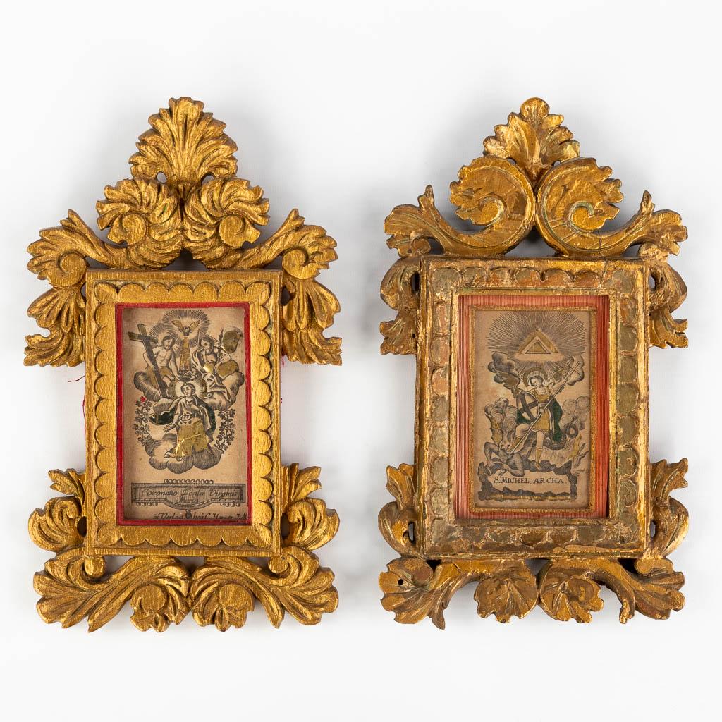 Two wood-sculptured frames with Santjes. 18th/19de/20ste eeuw. (W:17 x H:28 cm): Two wood-sculptured frames with Santjes. Santjes are 18th century. One frame 19th century. The other 20th century. Santjes of 'Saint Michel Ar Cha' and 'Coronatto Beate Vi