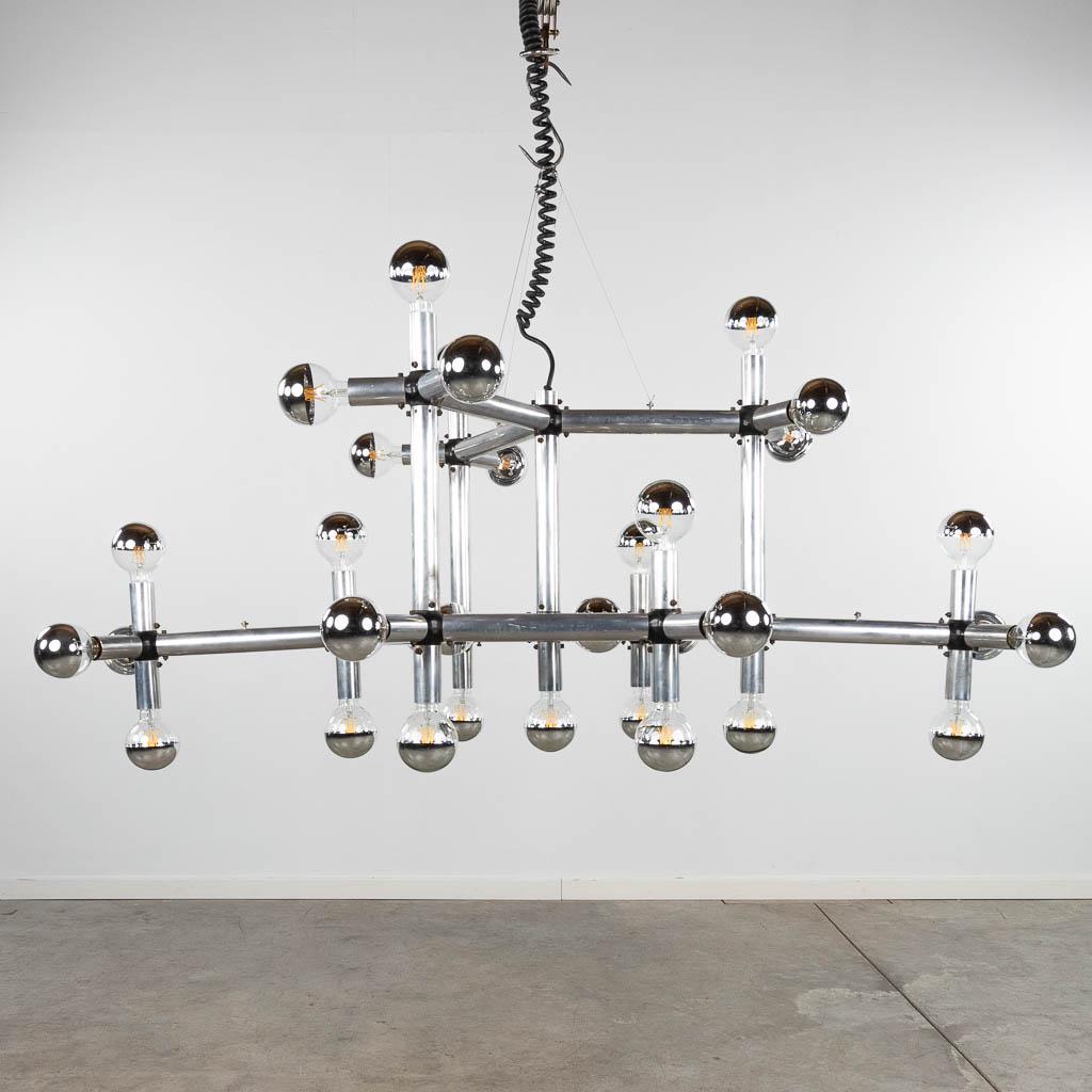 Robert HAUSSMANN (1931) 'Lichtstruktur' ceiling lamp. (D:80 x W:170 x H:100 cm): Robert HAUSSMANN (1931) 'Lichtstruktur' ceiling lamp. The lamp is including all new LED light bulbs with a mirror. Dimensions: (D:80 x W:170 x H:100 cm)
