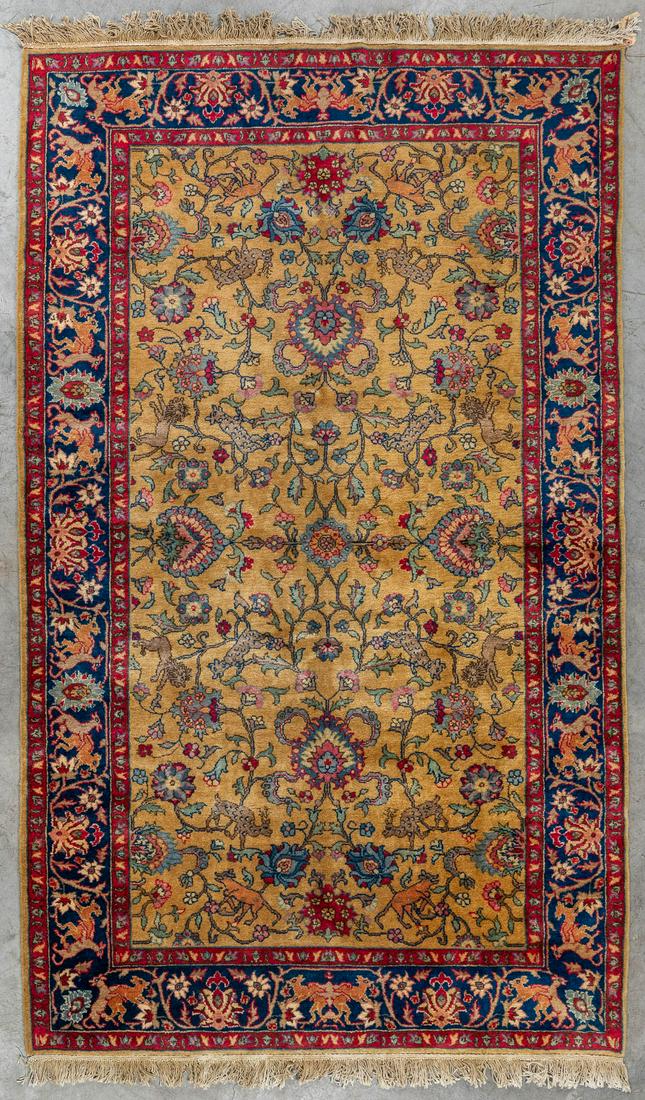 An Oriental hand-made carpet decorated with animals, Kashan. (D:253 x W:153 cm) (1 of 6)