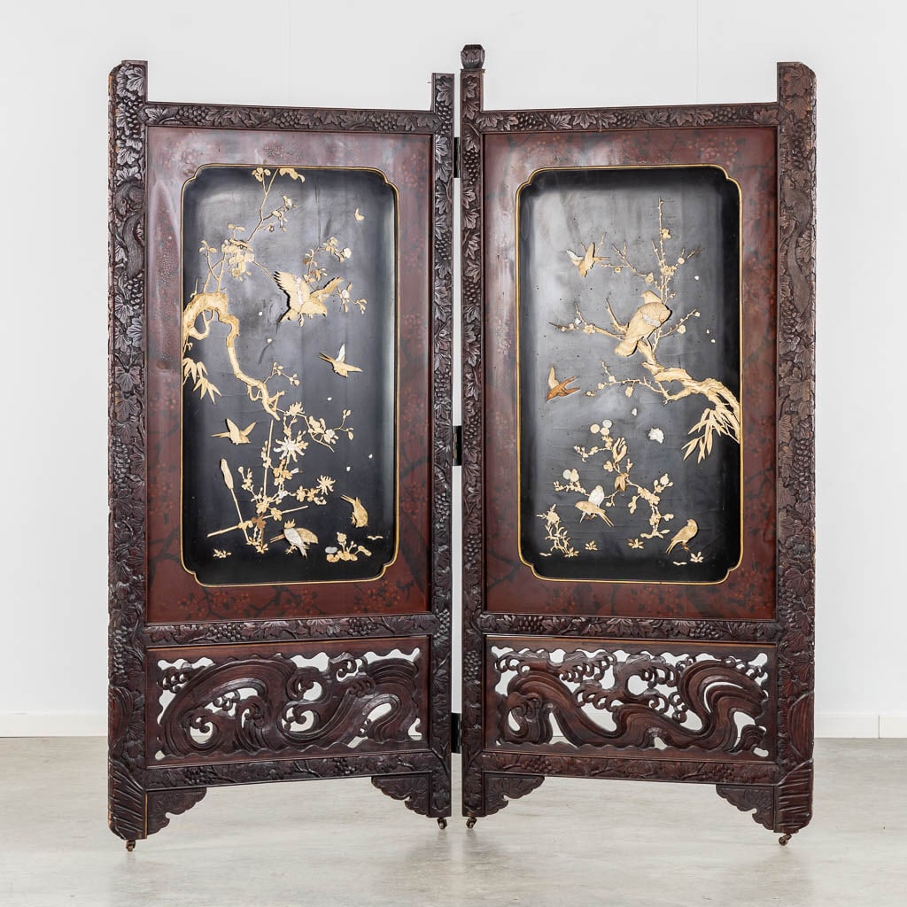 An Oriental two-piece folding screen, sculptured wood decorated with fauna and flora. (W:172 x H:182 (1 of 20)