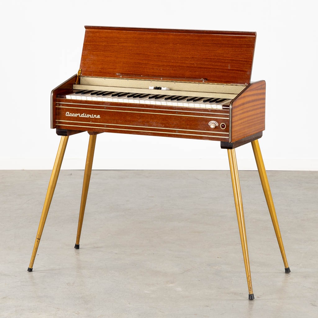 A mid-century piano, Accordionine. Italy, circa 1950. (L:37 x W:79 x H:80 cm): A mid-century piano, Accordionine. Italy, circa 1950. Condition report: Not tested. Dimensions: (L:37 x W:79 x H:80 cm)