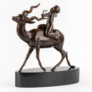 Cupid riding an Antelope, patinated bronze on a black marble base. (L:16 x W:40 x H:40 cm): Cupid riding an Antelope, patinated bronze on a black marble base. In the manner of sculptures made by Carl Paul Jennewein. Not signed. Dimensions: (L:16 x W:40 x H:40 cm)