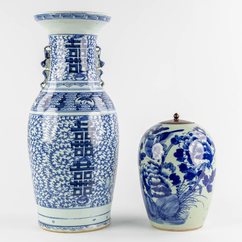 A Chinese celadon vase and ginger jar with a blue-white Double Xi and Floral decor. 19th/20th C.: A Chinese celadon vase and ginger jar with a blue-white Double Xi and Floral decor. 19th/20th century. Dimensions: (H:59 x D:25 cm)