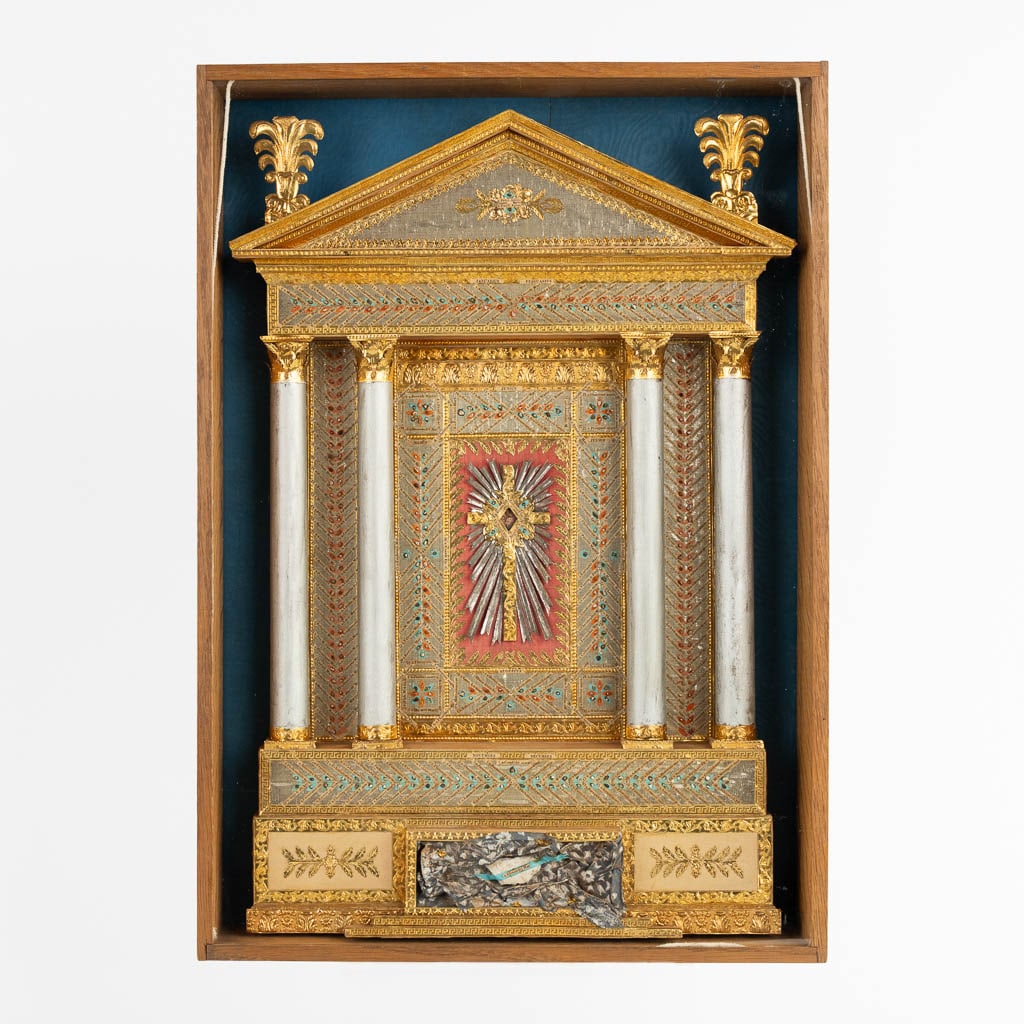 A large reliquary calendar, added with a relic of the True Cross and Objects of passion. 19th C. (1 of 9)