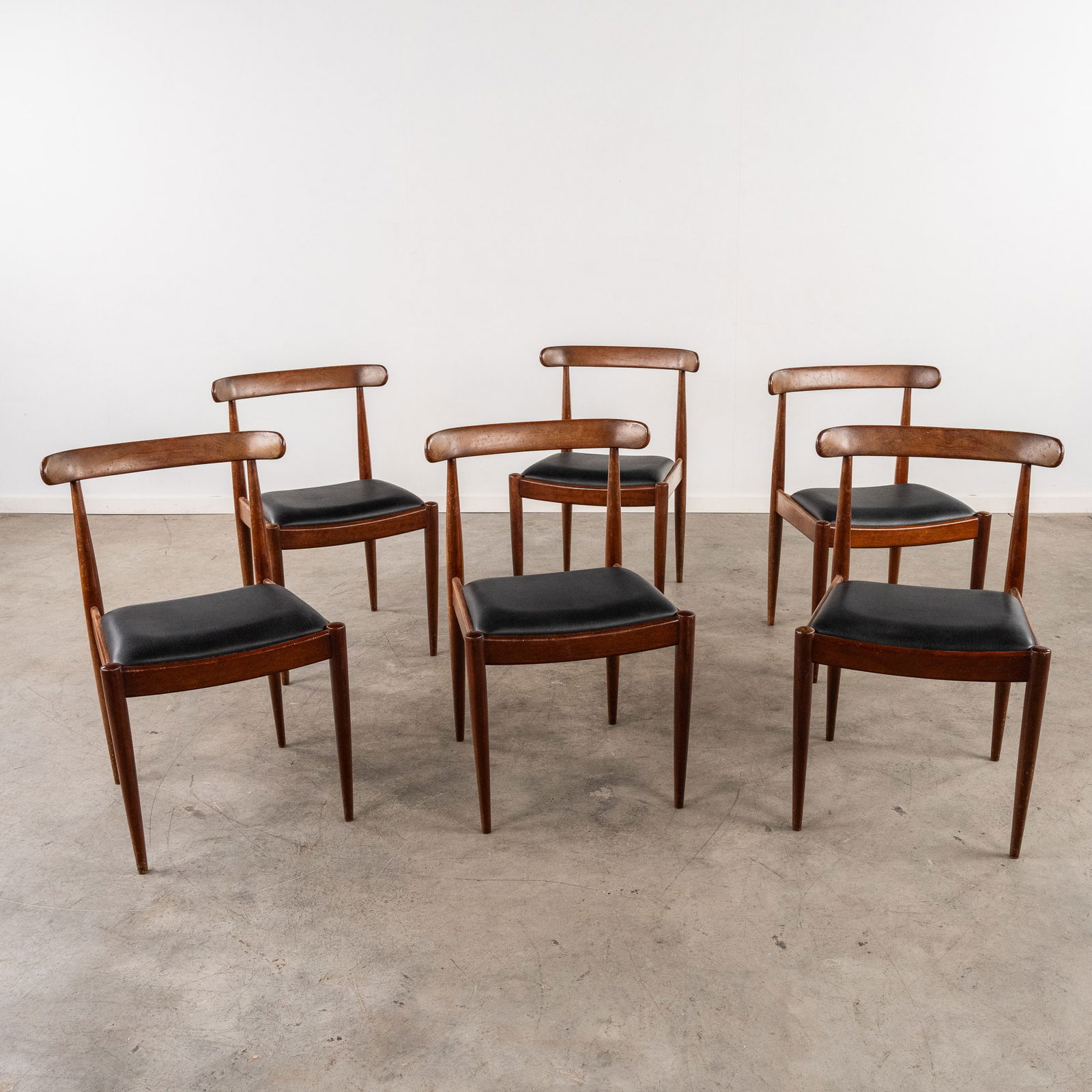 Alfred Hendrickx (1931) '6 Chairs' For Belform.: Alfred HENDRICKX (1931) '6 chairs' For Belform.¬†, Hardwood finished with a faux-leather seat cover.¬†