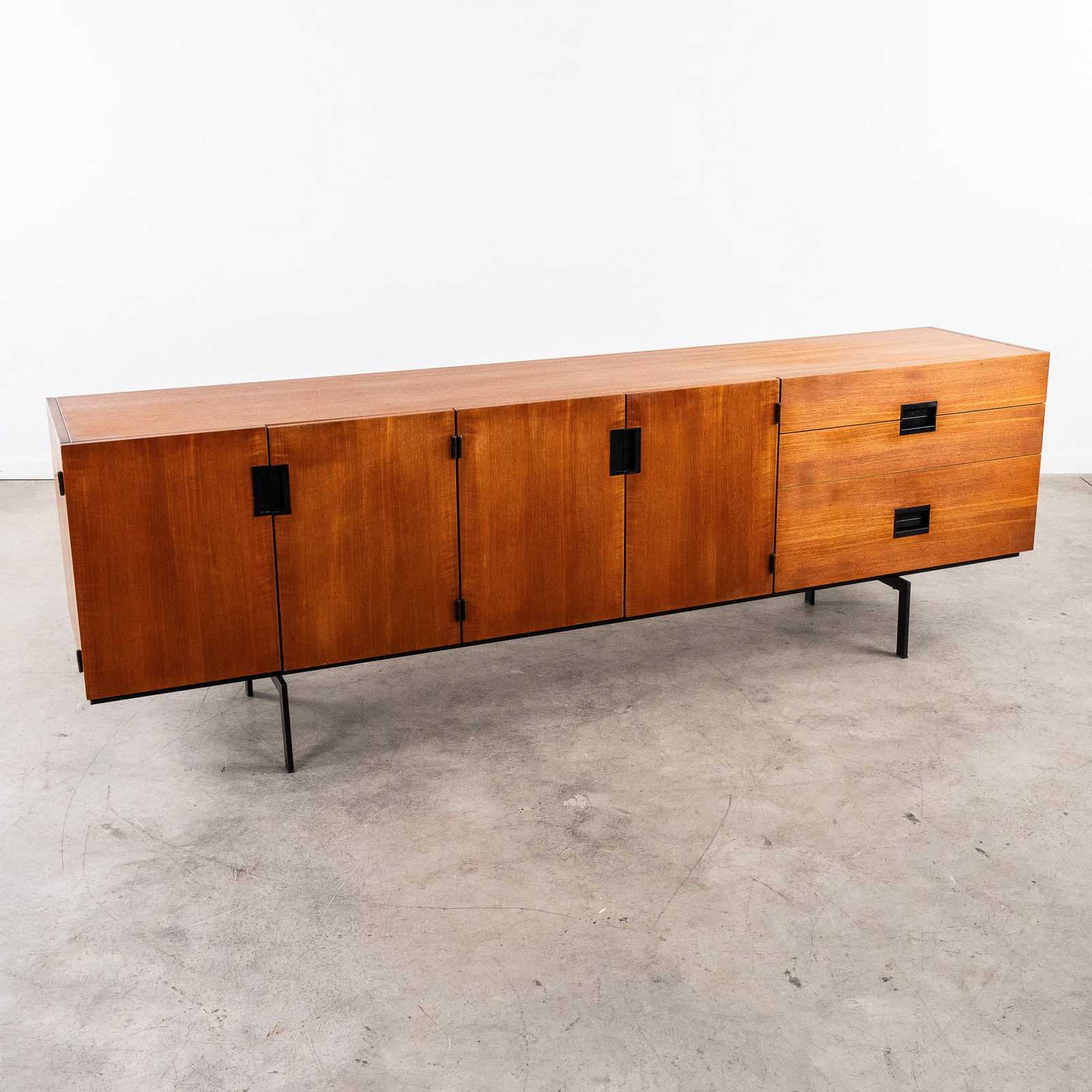 Cees Braakman (1917-1995) 'Sideboard' For Pastoe. Circa 1960.: Cees BRAAKMAN (1917-1995) 'Sideboard' for Pastoe. Circa 1960. , Teak veneer. Standing on patinated metal feet. Finished with black door and drawer handles. Circa 1960. 