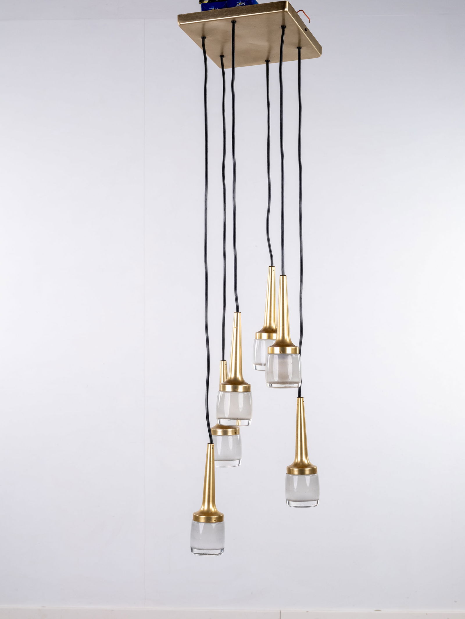 Staff Leuchten. A Cascade Chandelier with six points of light.: Staff Leuchten. A Cascade Chandelier with six points of light., Gilded metal and Glass.